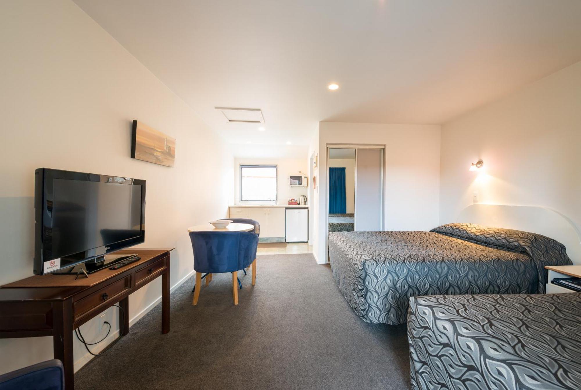 Triple Room with Queen and Single Beds