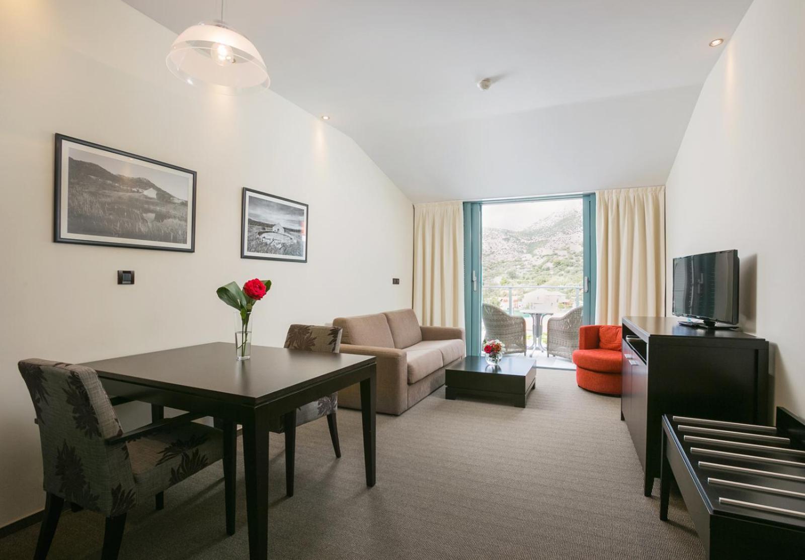 Suite with Balcony and Side Sea View