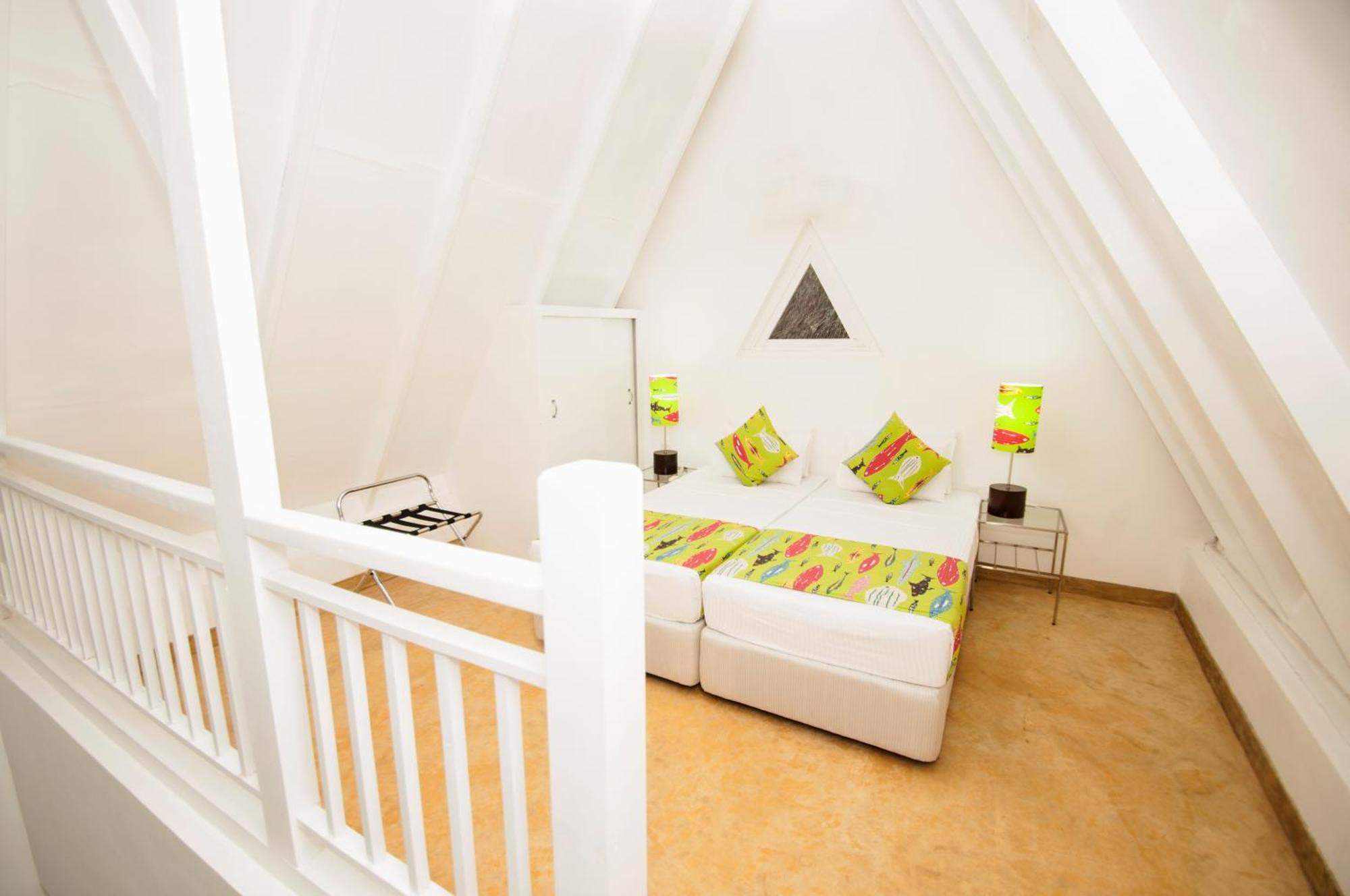 Deluxe Attic Family Room with a unique Yaara Tea experience and enjoy complimentary access to the Night Club, Karaoke, and Foosball.