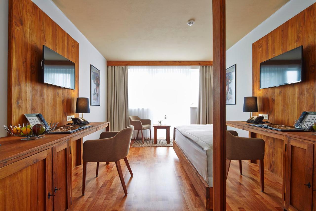Deluxe Room with Garden View and Balcony