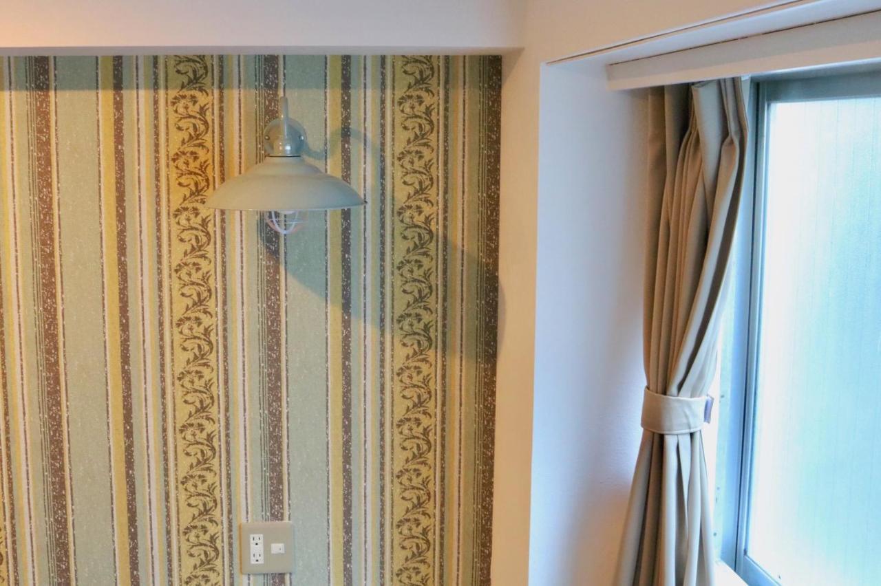 Quadruple Room with Shared Bathroom