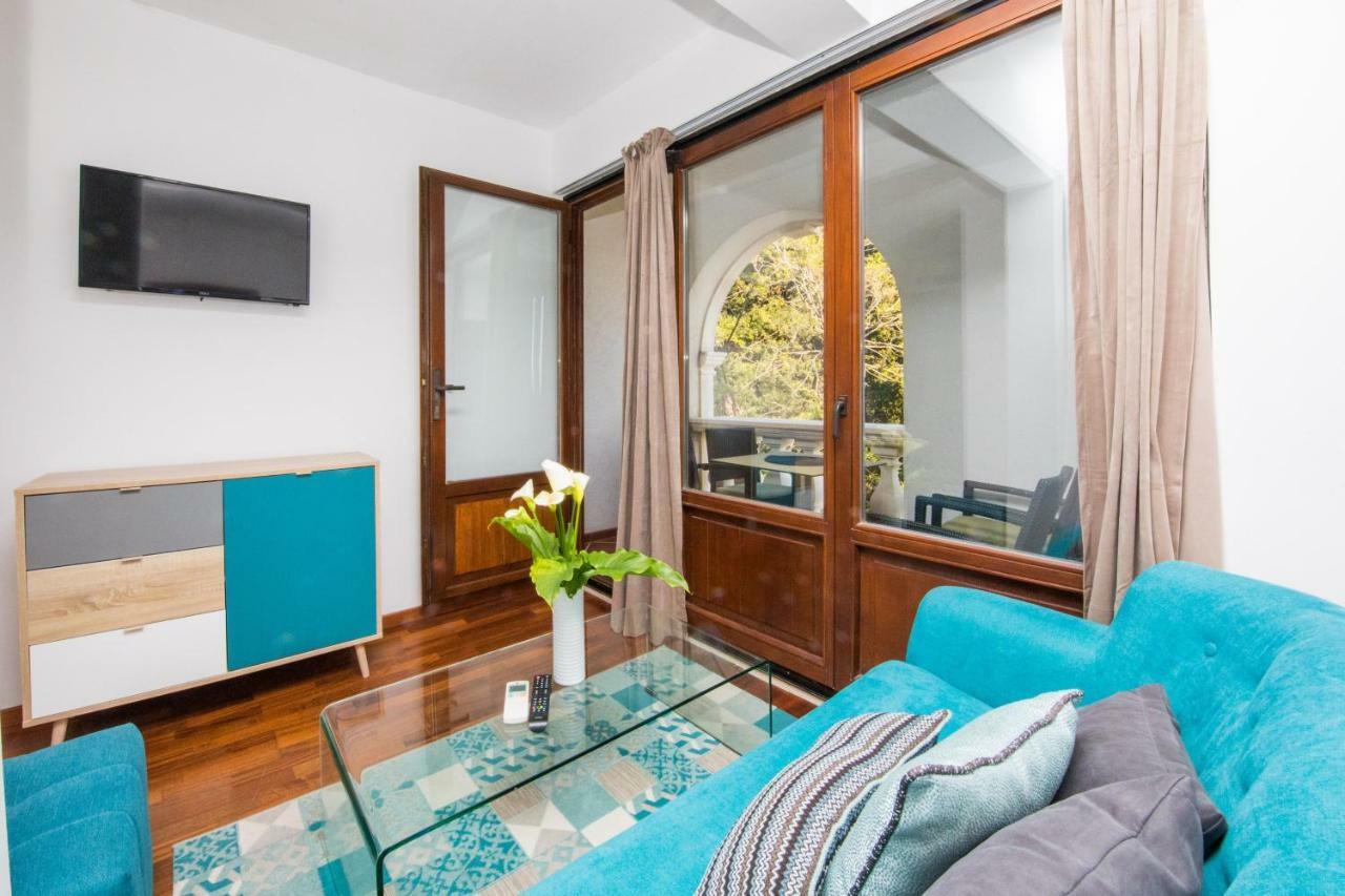 Two-Bedroom Suite with Balcony and Sea View