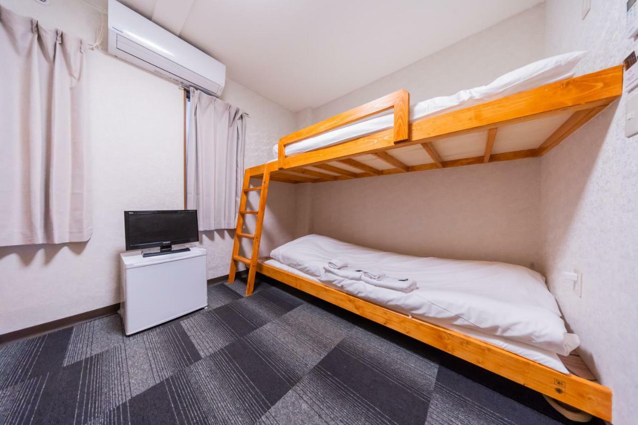 Quadruple Room with Shared Bathroom