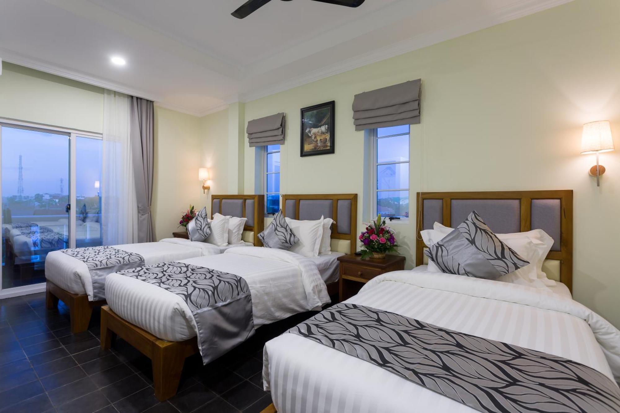 Deluxe Triple Room with Balcony