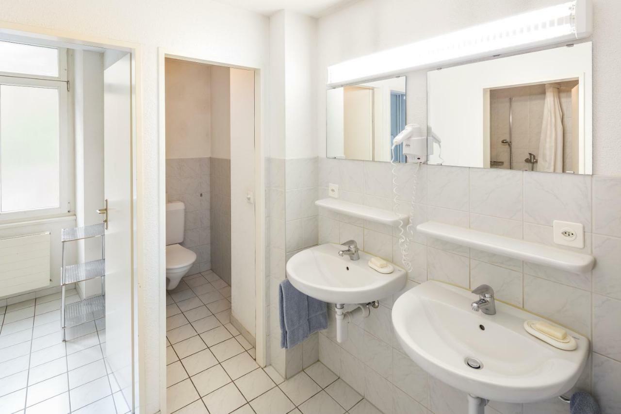 Single Room with Shared Shower and Toilet