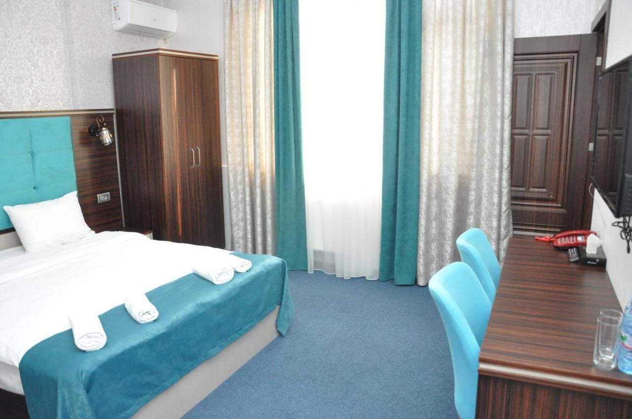 Quadruple Room with Private Bathroom