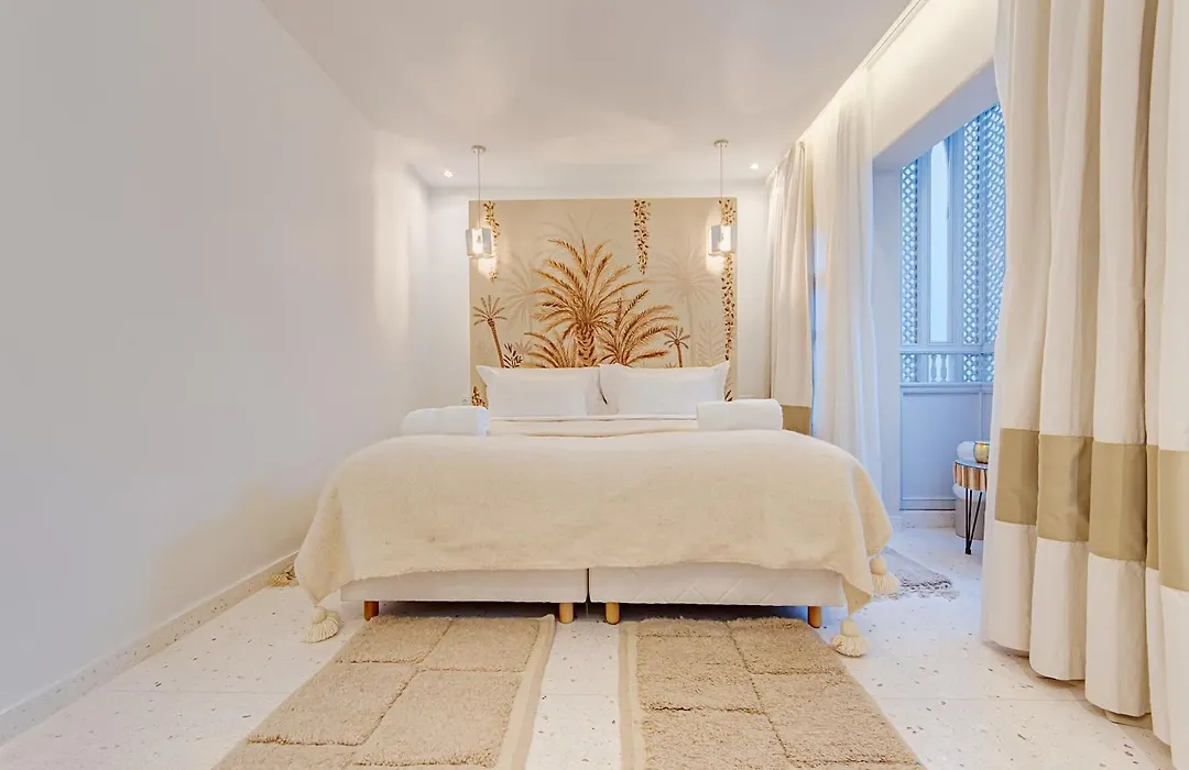 Riad K-White-1