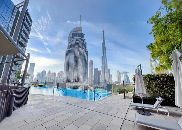 Skyline Retreats Holiday Homes I Aura 1 & 2 Bedroom Apartments I Burj Khalifa & Fountain Views I Dubai Mall Access I Parking, Gym, Wi-Fi & Infinity Pool