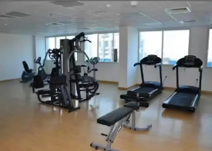 Vogue Vacation Homes, Sports City Elite Near First Avenue Mall, One Bedroom Apartment With Balcony And Vibrant Community View, Access To All Amenities Dubai